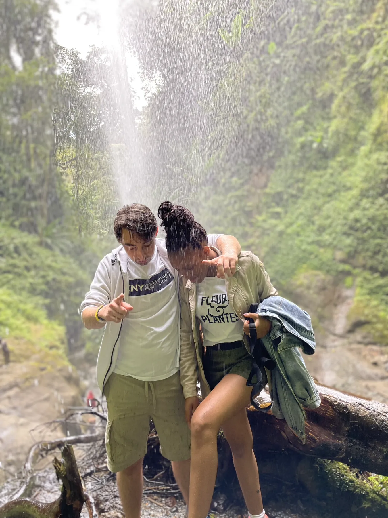 Vio and Philipp sharing a spontaneous moment beneath Napuru Waterfalls