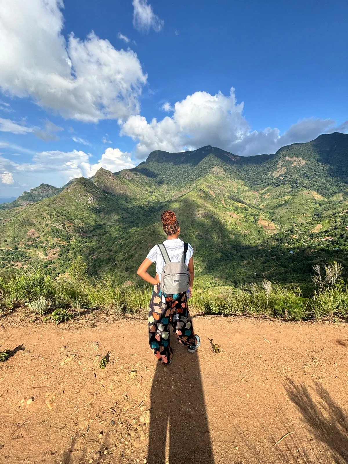Violet looking across the Morogoro Mountains from a high viewpoint